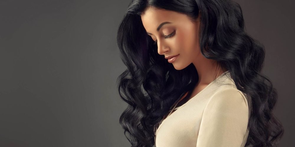 Importance of hair for women — long, healthy, beautiful black hair symbolizing feminine energy, intuition, and divine connection. | The Sublime Woman