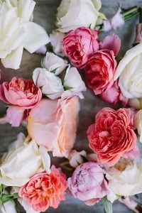A mix of roses and peonies together