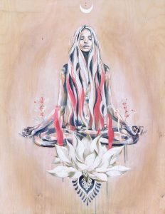Woman sitting in lotus position