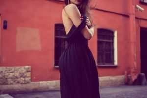 Woman in black dress women's disease in Vedas feminine health | The Sublime Woman