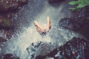 Woman under the shower energy practice | The Sublime Woman