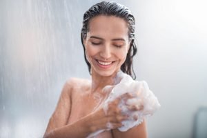 Woman under the shower energy practice | The Sublime Woman