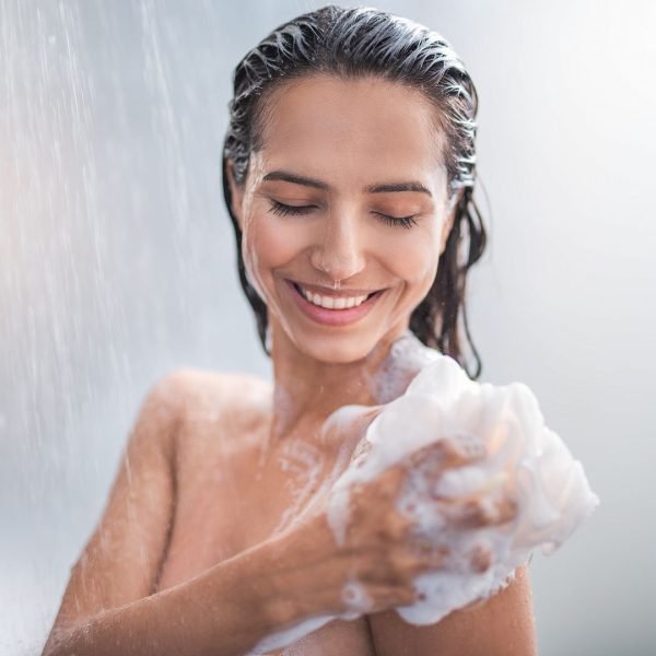 Woman under the shower energy practice | The Sublime Woman