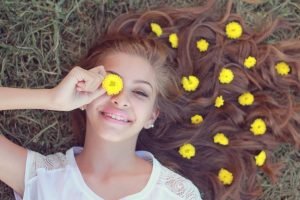 Beautiful young woman with long hair power of hair | The Sublime Woman