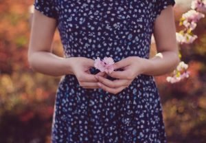 Woman's beauty is her dharma young woman with flower | The Sublime Woman