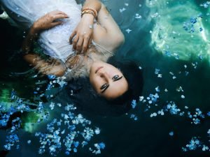 Woman watching the water wise woman's energy secrets | The Sublime Woman