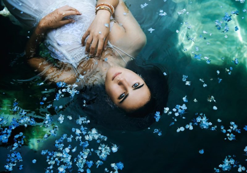 Woman watching the water wise woman's energy secrets | The Sublime Woman