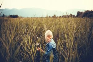 Woman in the field exercise to increase femininity | The Sublime Woman