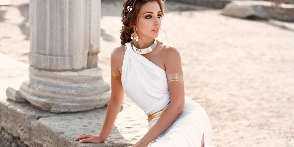 Belt of Aphrodite exercise for femininity young beautiful woman Greek style white dress | The Sublime Woman