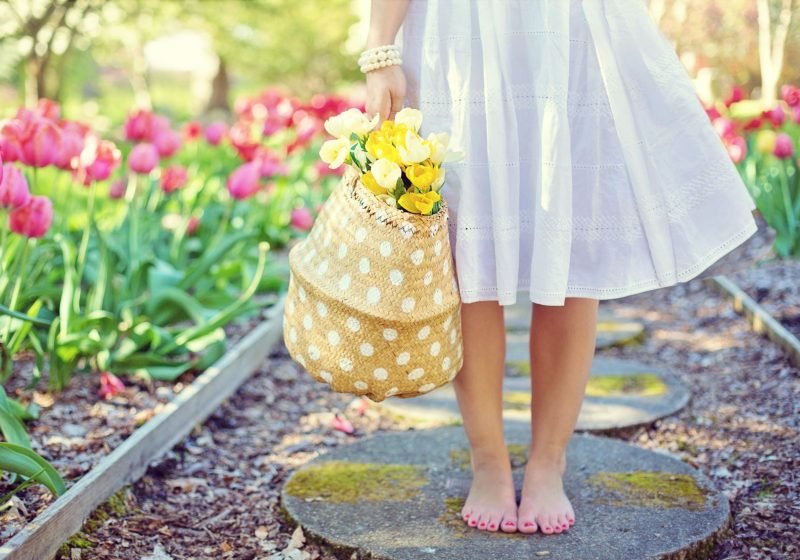 Earth Energy for Woman woman barefoot with flowers | The Sublime Woman