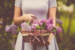 Women and Flowers Sacred Union Woman holding flowers | The Sublime Woman