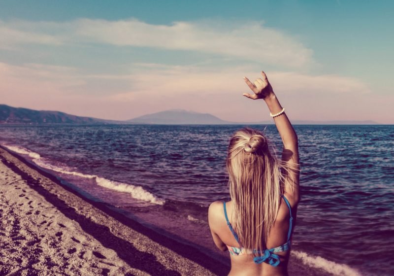 How to balance masculine and feminine energy beautiful woman on the beach | The Sublime Woman