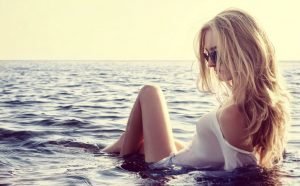 Body Habits of Woman with Self-Love beautiful woman on the beach | The Sublime Woman
