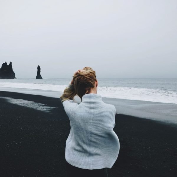 Strengthening energy protection aura exercise woman sitting on the beach | The Sublime Woman