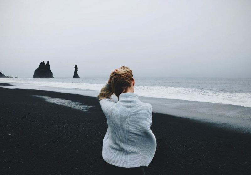 Strengthening energy protection aura exercise woman sitting on the beach | The Sublime Woman
