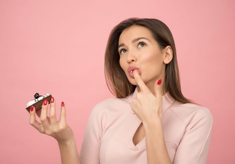 Ayurvedic Secrets of Eating for Women ayurvedabeautiful woman eating sweets | The Sublime Woman