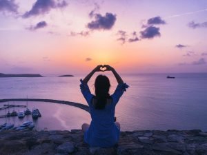 Evening Sadhana spritual practice for women evening woman sitting with love | The Sublime Woman