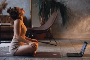 Evening Sadhana Ritual, young woman meditating in the evening, evening meditation practice for women | The Sublime Woman