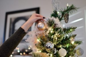 Magical Christmas Tree Decorating woman decorating the tree christmas ritual | The Sublime Woman