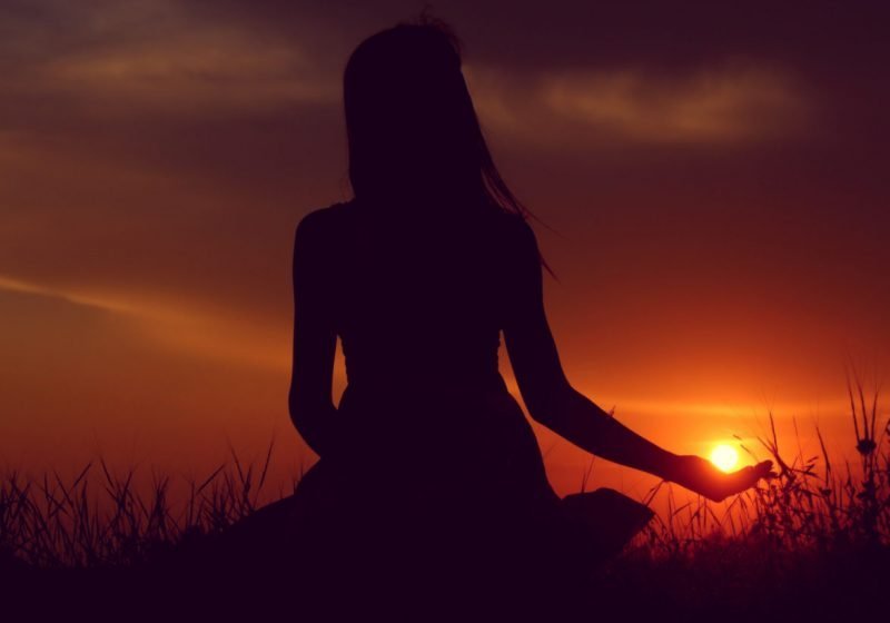 Energy Sources For Woman woman sitting looking at sunset | The Sublime Woman