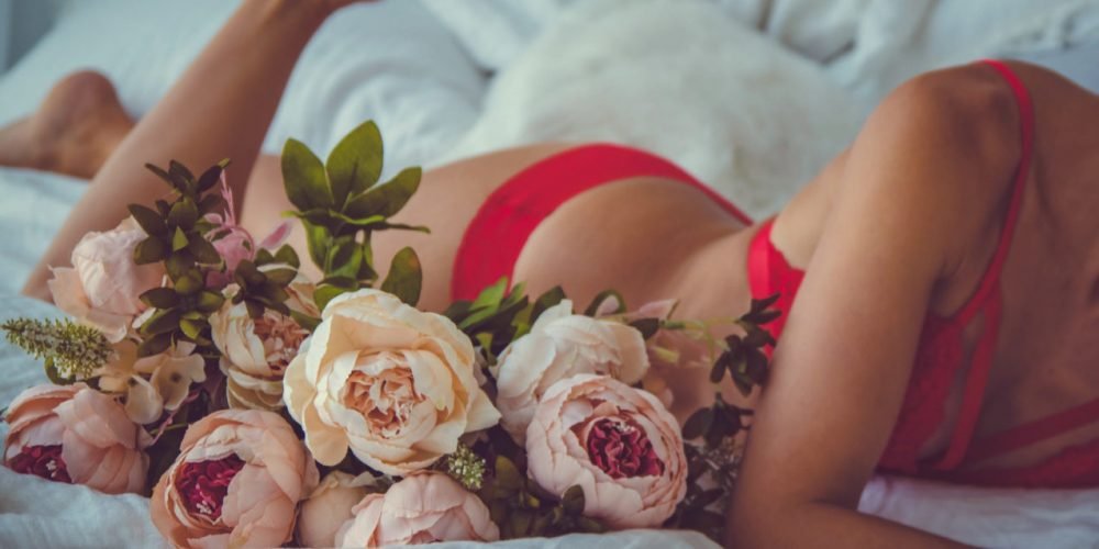 Magical Meditation For Women beautiful woman in lingerie in bed with flowers | The Sublime Woman