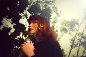 Femininity and the city how to stay feminine woman in a big city beautiful lady red hair red lips | The Sublime Woman