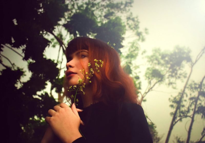 Femininity and the city how to stay feminine woman in a big city beautiful lady red hair red lips | The Sublime Woman