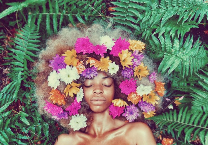 Overcoming Hurt Feminine Rituals beautiful black woman with flowers | The Sublime Woman