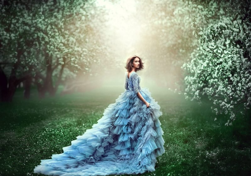Practice Woman's Vishuddha Chakra Healing beautiful woman in blue fluffy dress in the woods | The Sublime Woman