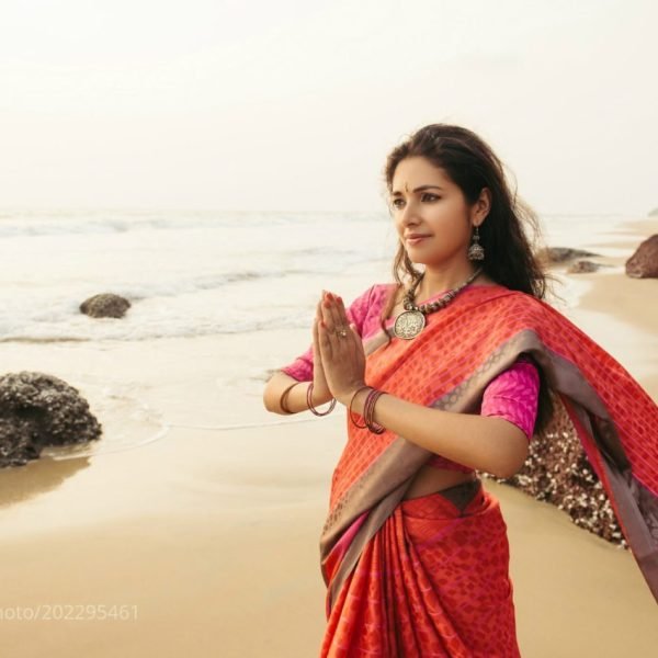 Mantras for Women beautiful woman in indian dress praying | The Sublime Woman