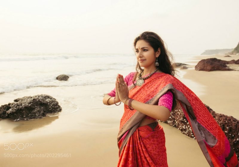 Mantras for Women beautiful woman in indian dress praying | The Sublime Woman